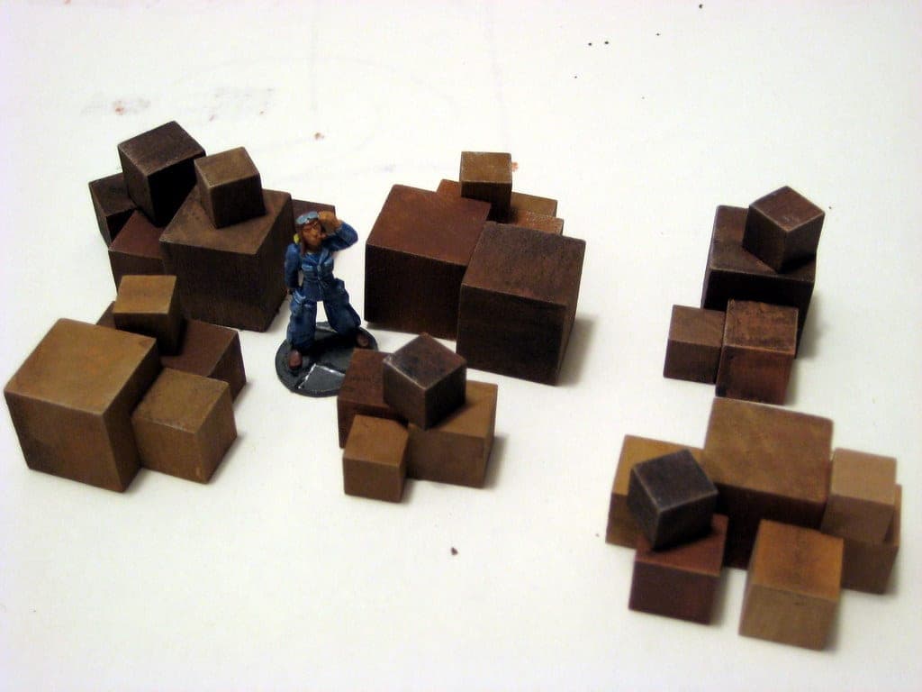 Painted miniature figures on a work surface