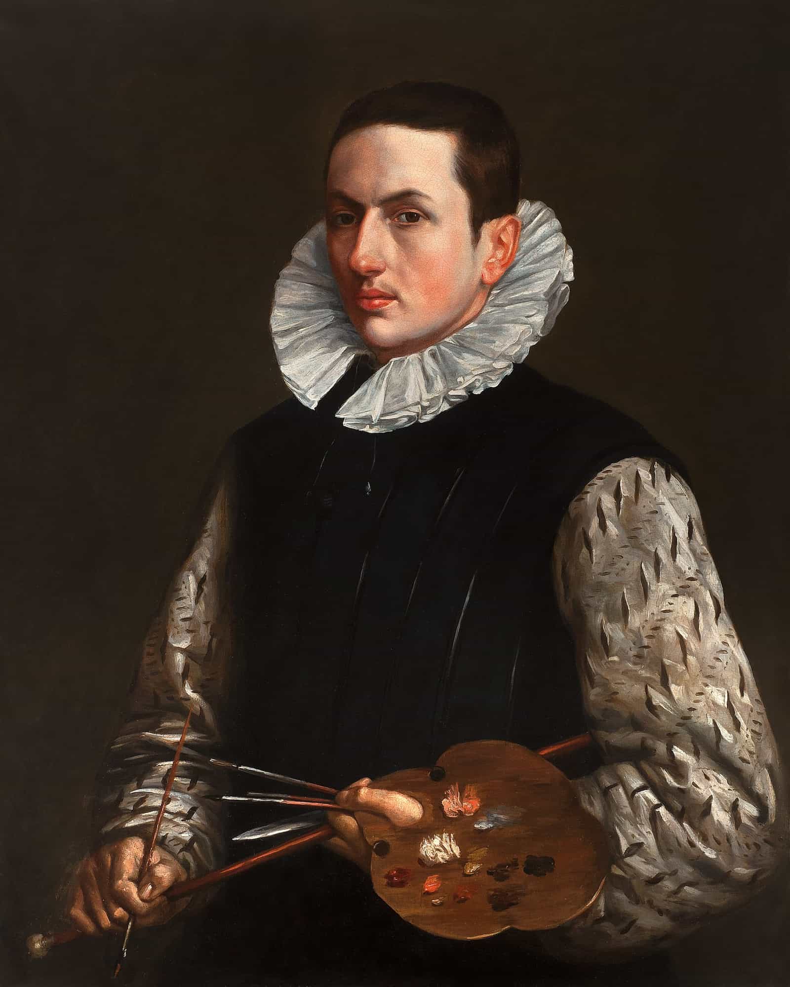 A fine brush tip painting a small detail
