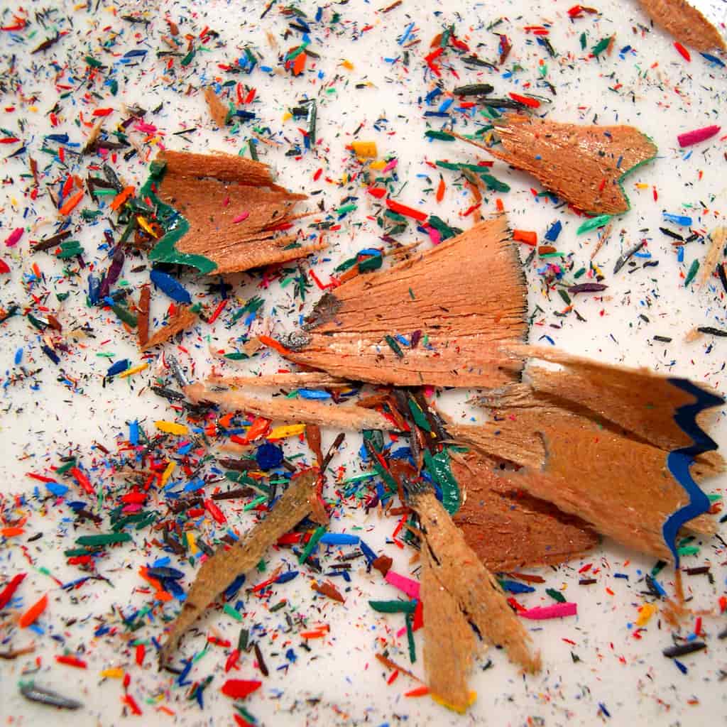 A palette with several paint types mixed out